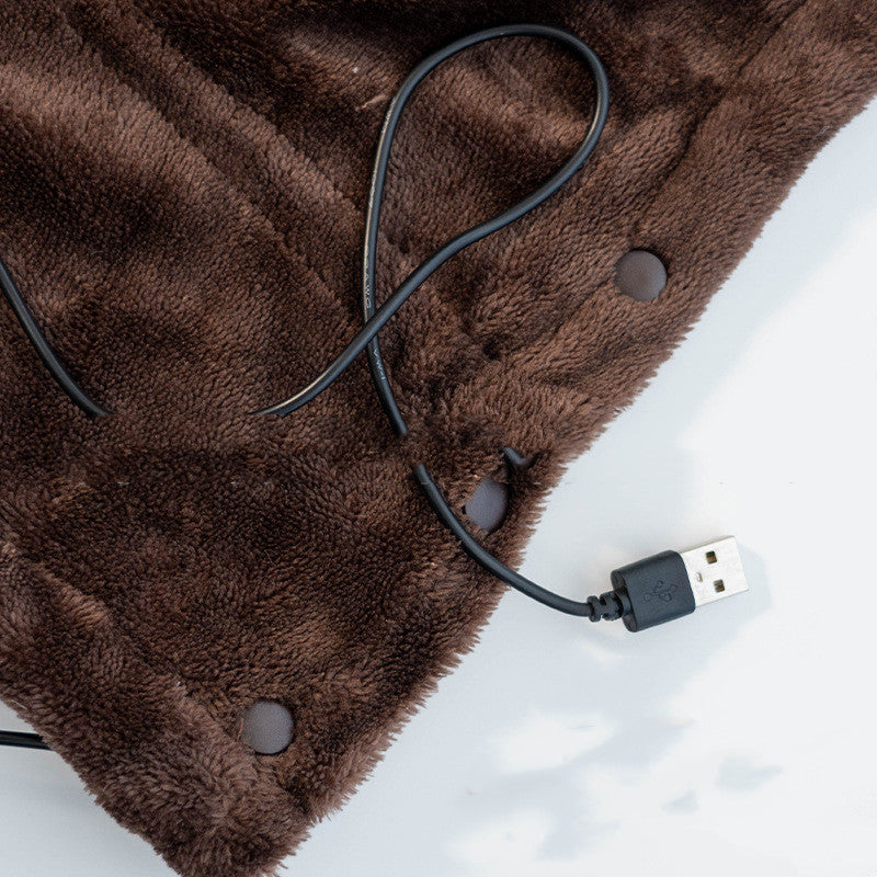 Bruine verwarmingsdeken met USB-kabel, close-up