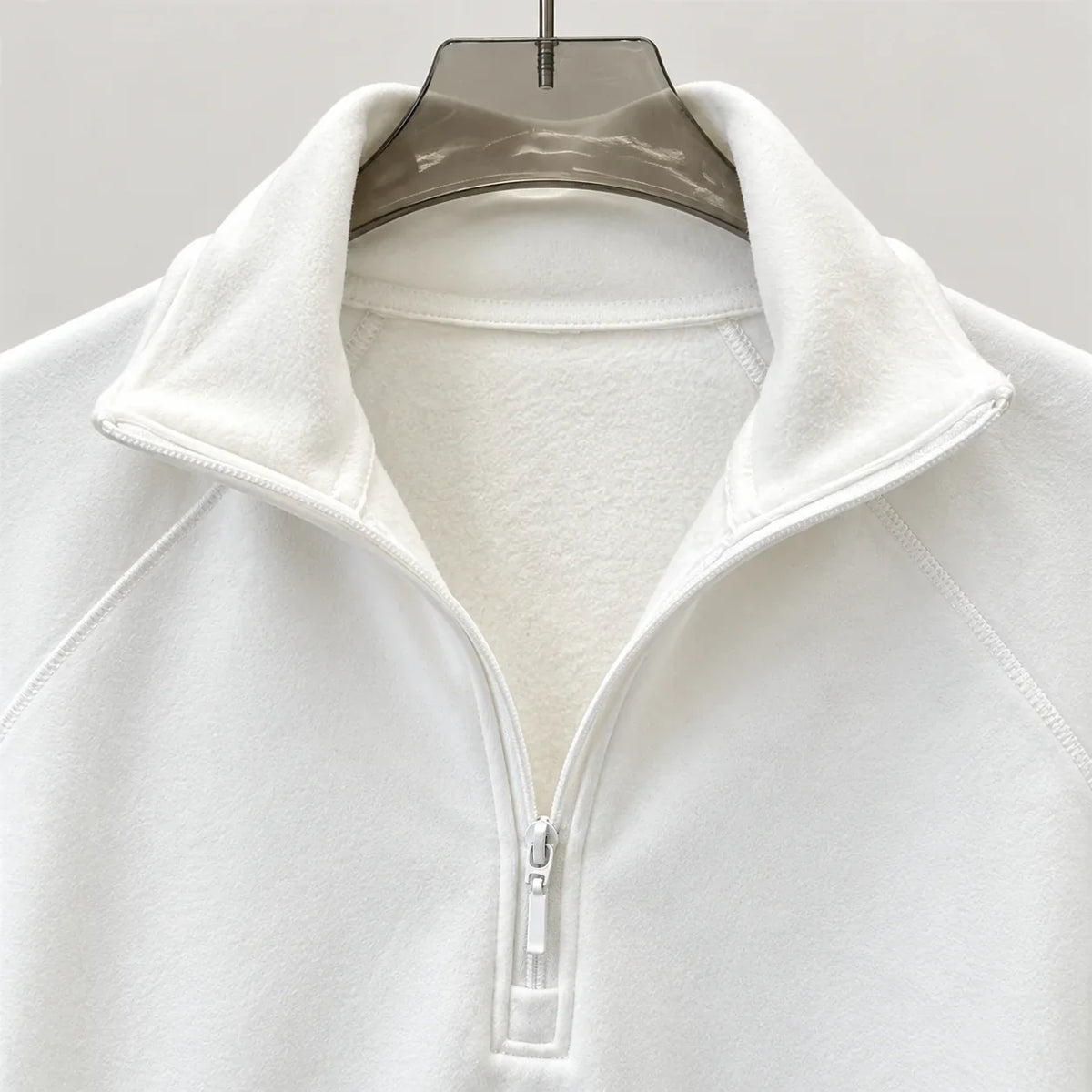 Fleece half-zip dames – gebroken wit, geopende kraag en fleece binnenzijde