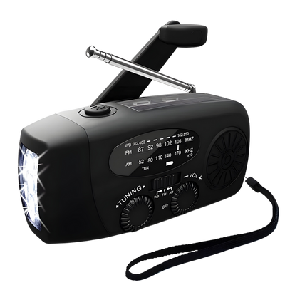 Noodradio rood die opwindbaar is en met een solar zonnepaneel die je telefoon oplaadt